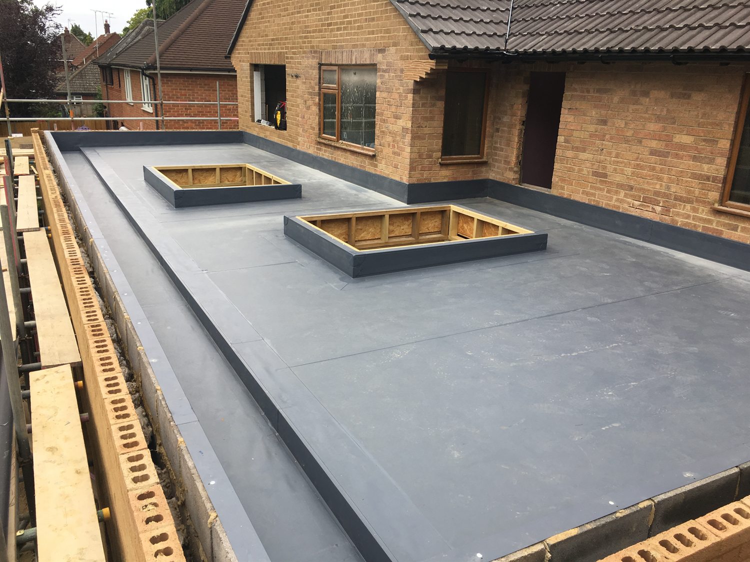 Completed single-ply membrane roof installation