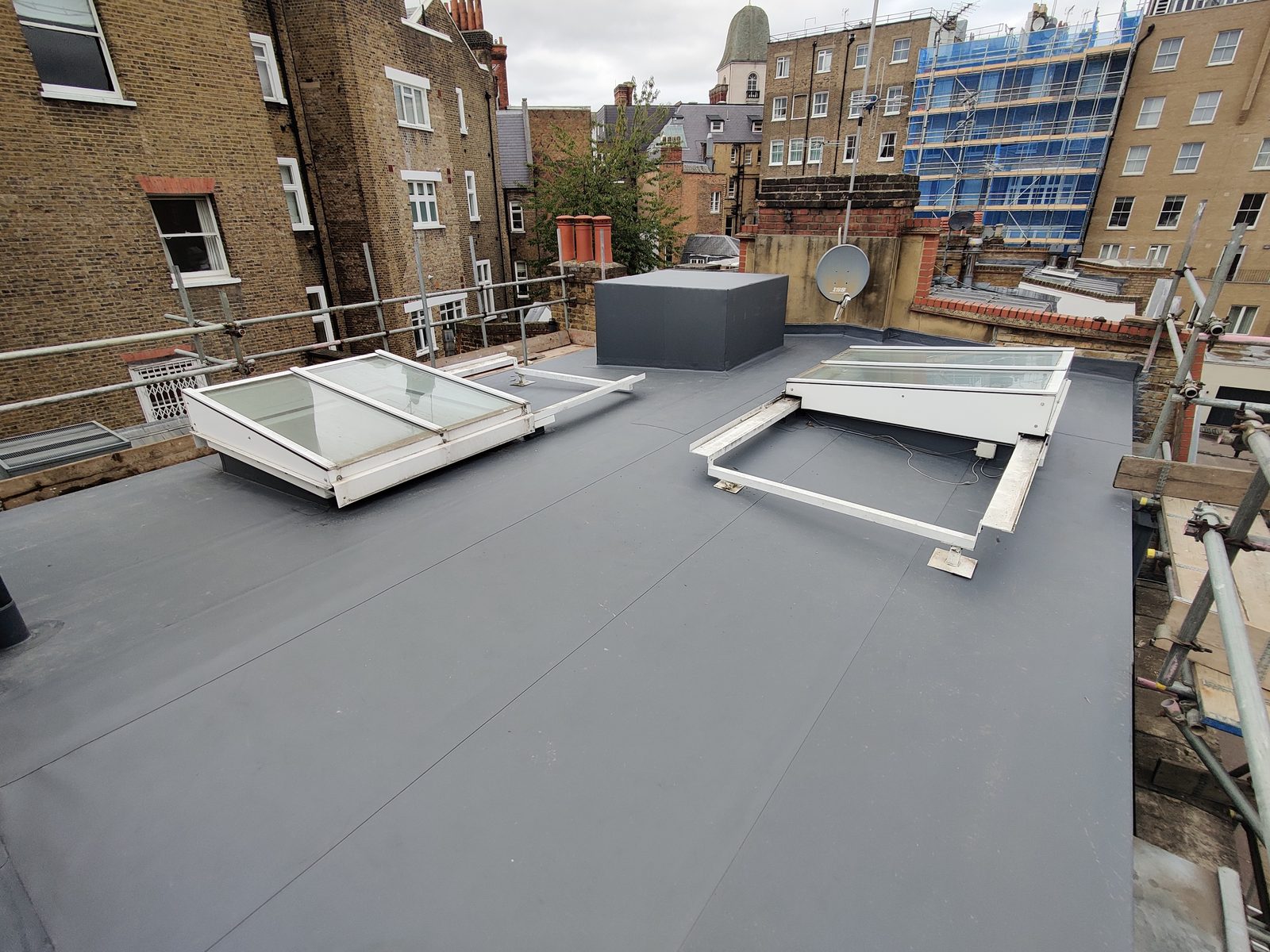 Completed single-ply flat roof with rooflights